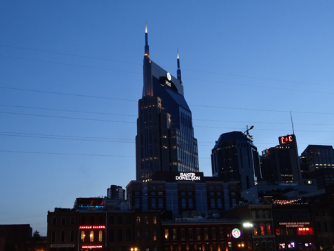 The Batman building at night from the water