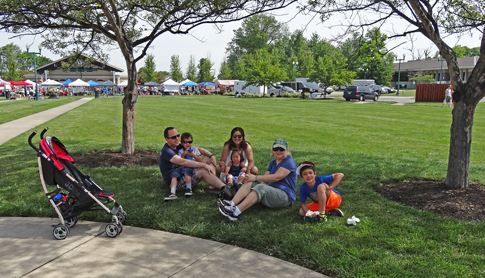 The gang relaxing after walking to and through the Fishers Farmers Market
