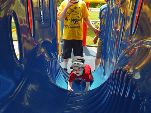 Ezra climbing through the tunnel