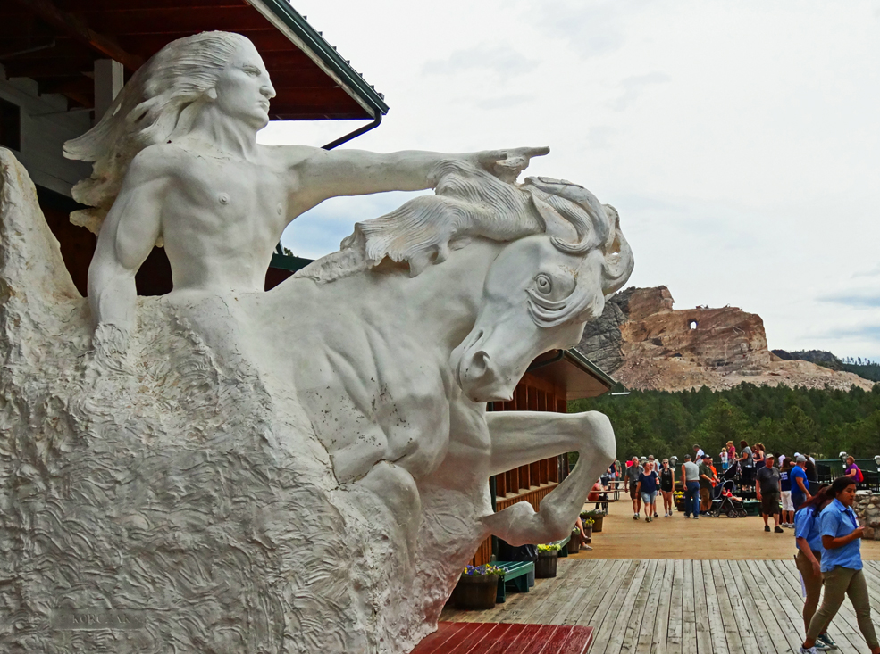 The sculpture�s model with the in-process monument in the back ground