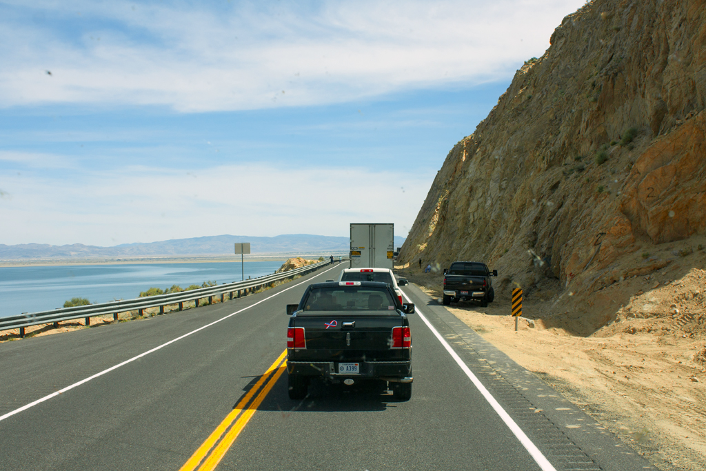 Road block, tractor-trailer overturned up ahead