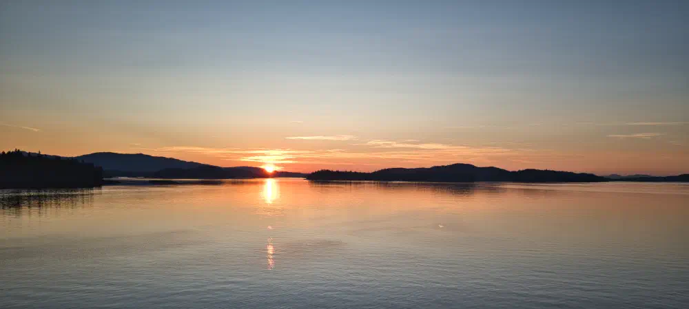 Sunset out our balcony as we head on to Juneau