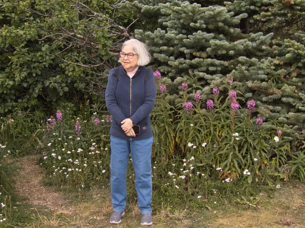 Becky near the beautiful fireweed, very common in Alaska